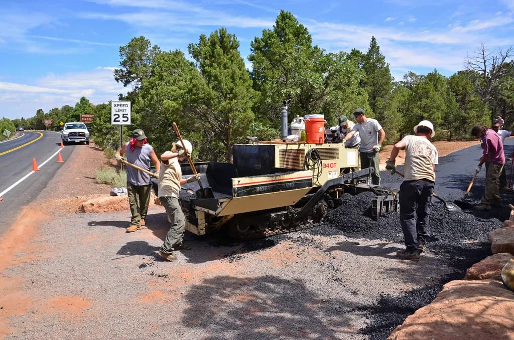 Crew working on an asphalt paving project