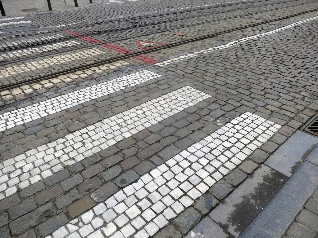 Paver surface with a contrasting border course